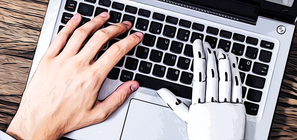 une main artificielle et une main humaine tapent sur un clavier d ordinateur
